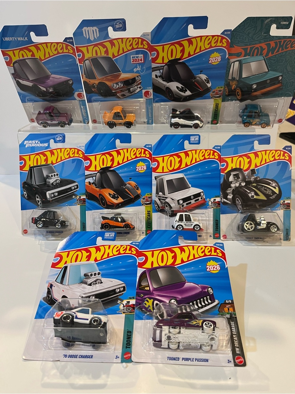 Hot Wheels Tooned vehicles, including cartoonishly stylized models